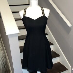 CDC Black Short Cocktail dress with Beaded Straps that Crisscross in the Back. S
